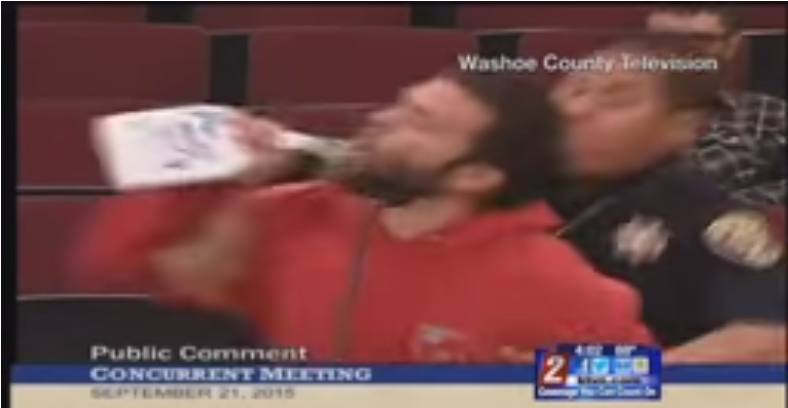 Activist Pretended to Drink “Roundup” at Town Meet