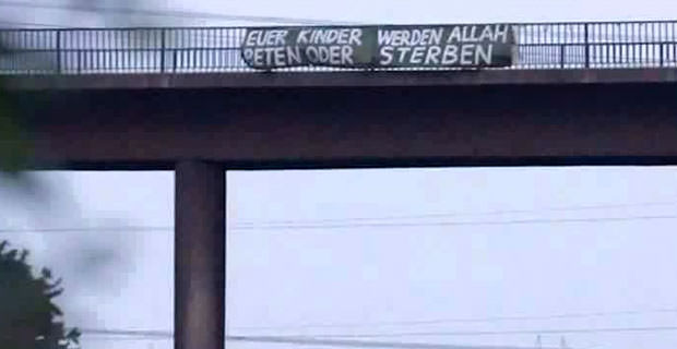 Highway Overpass Banner Threatens German Children Will Pray To Allah “Or Die”