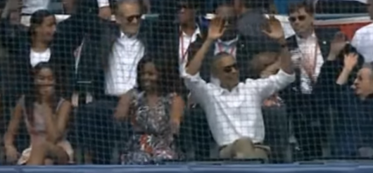 Obama Enjoys Baseball As Brussels Burns