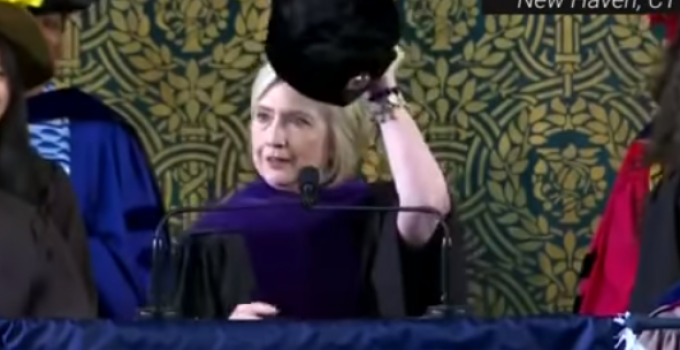 Hillary Clinton Trolls President Trump with Russian Hat During Speech at Yale