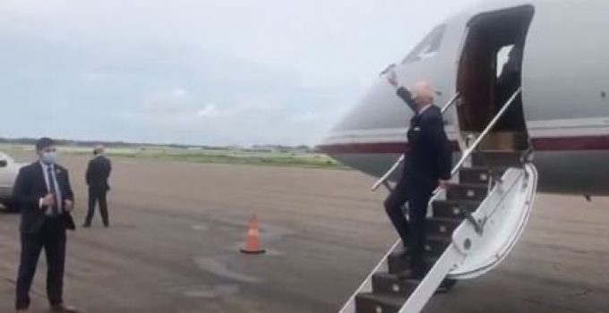 Joe Biden Waves at Empty Field as He Departs Plane in Tampa